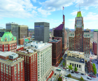 photo of downtown Baltimore with oversaturated colors as seen from the roof of the 2Hopkins apartments building