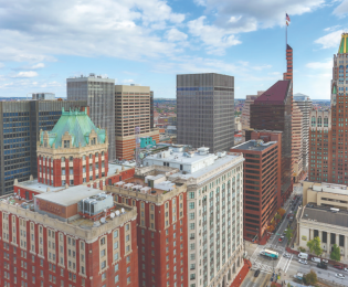 photo of tops of buildings in downtown Baltimore as seen from the roof of 2Hopkins apartments